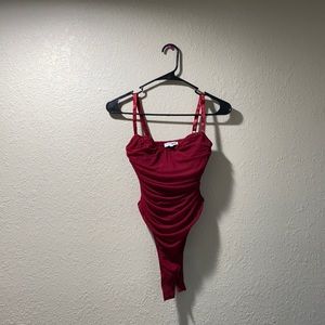 red bodysuit